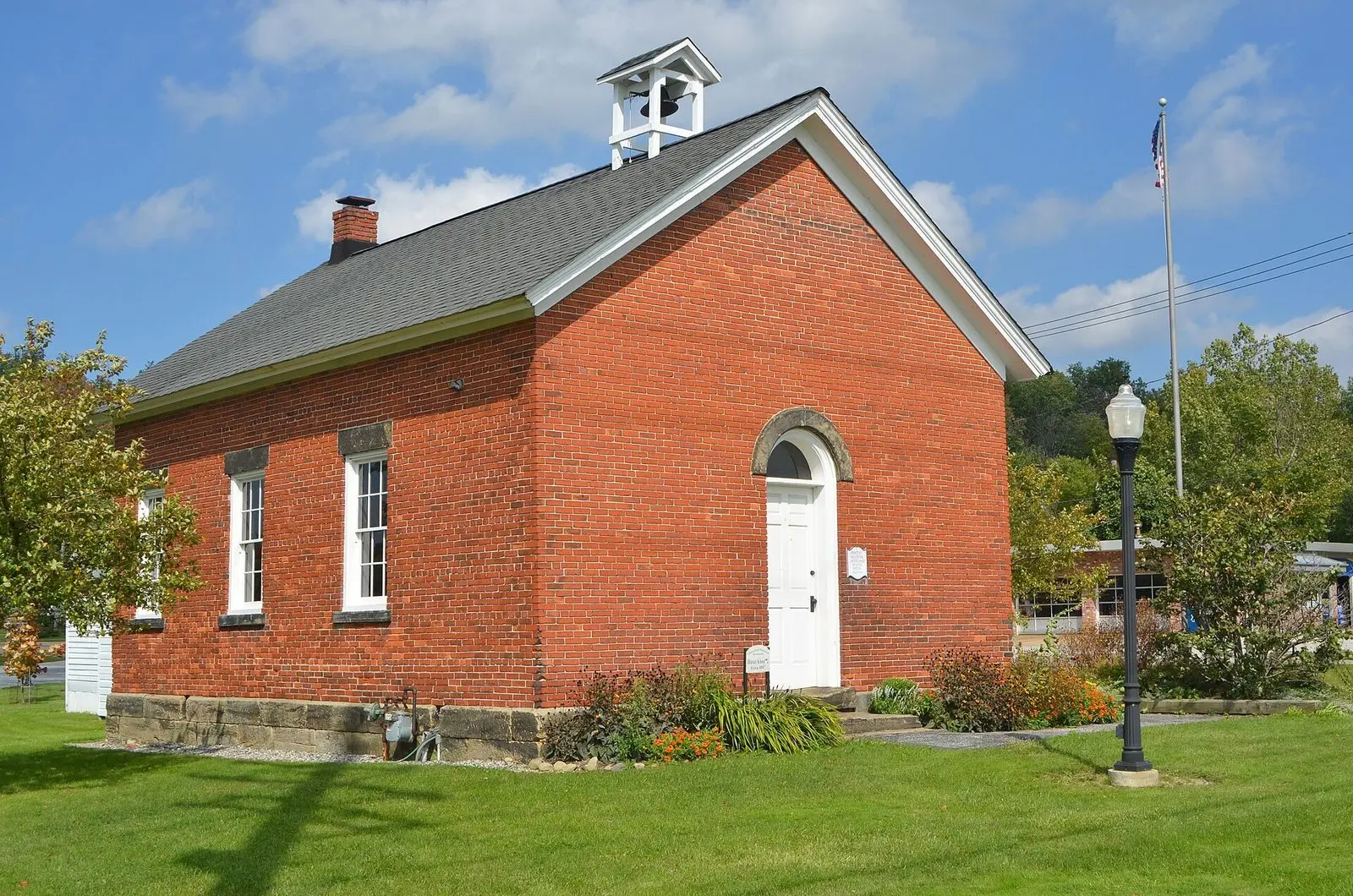 Historic red brick one-room schoolhouse in Chester Township