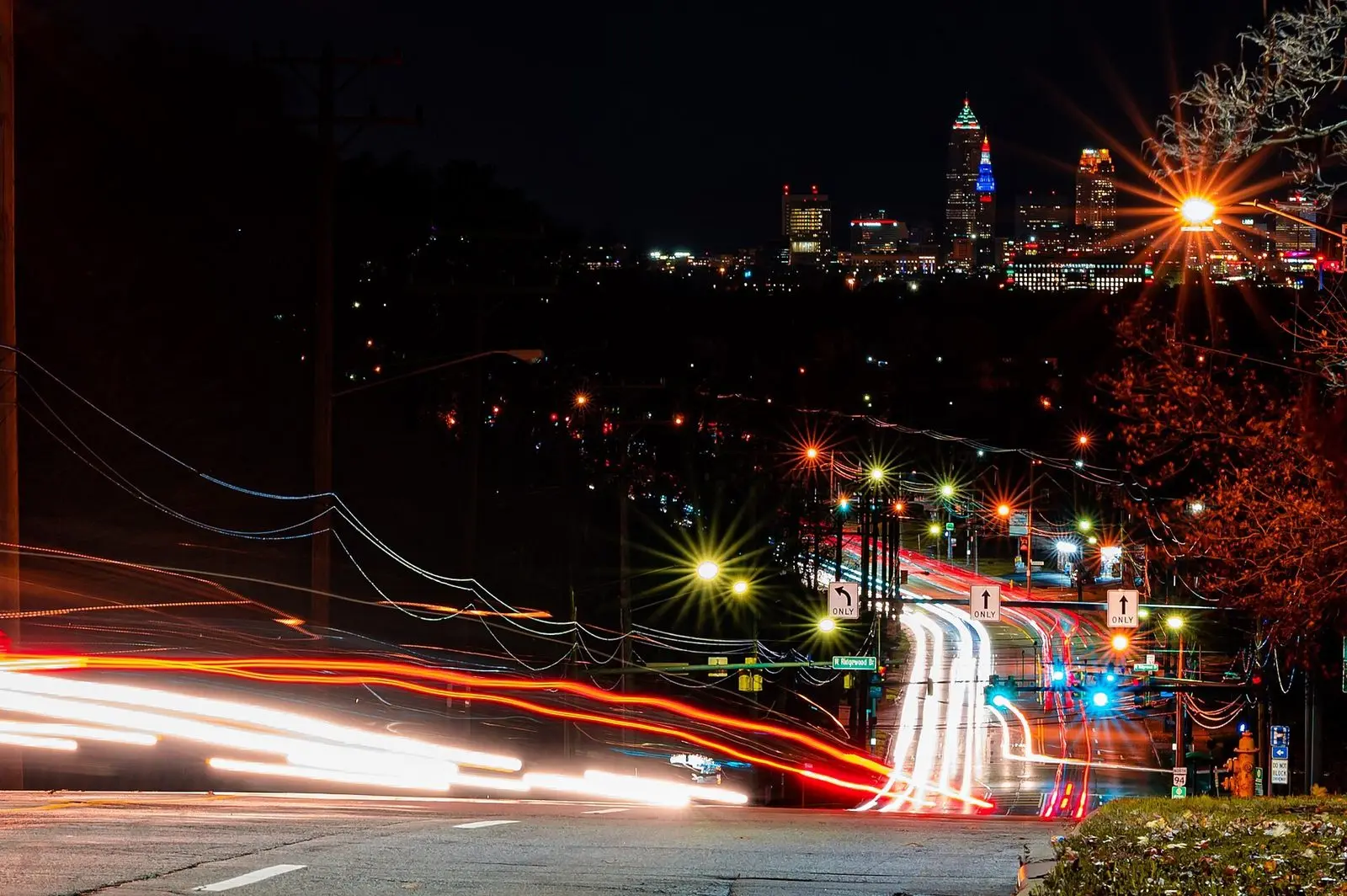 Night view down State Road in Parma toward the Cleveland skyline